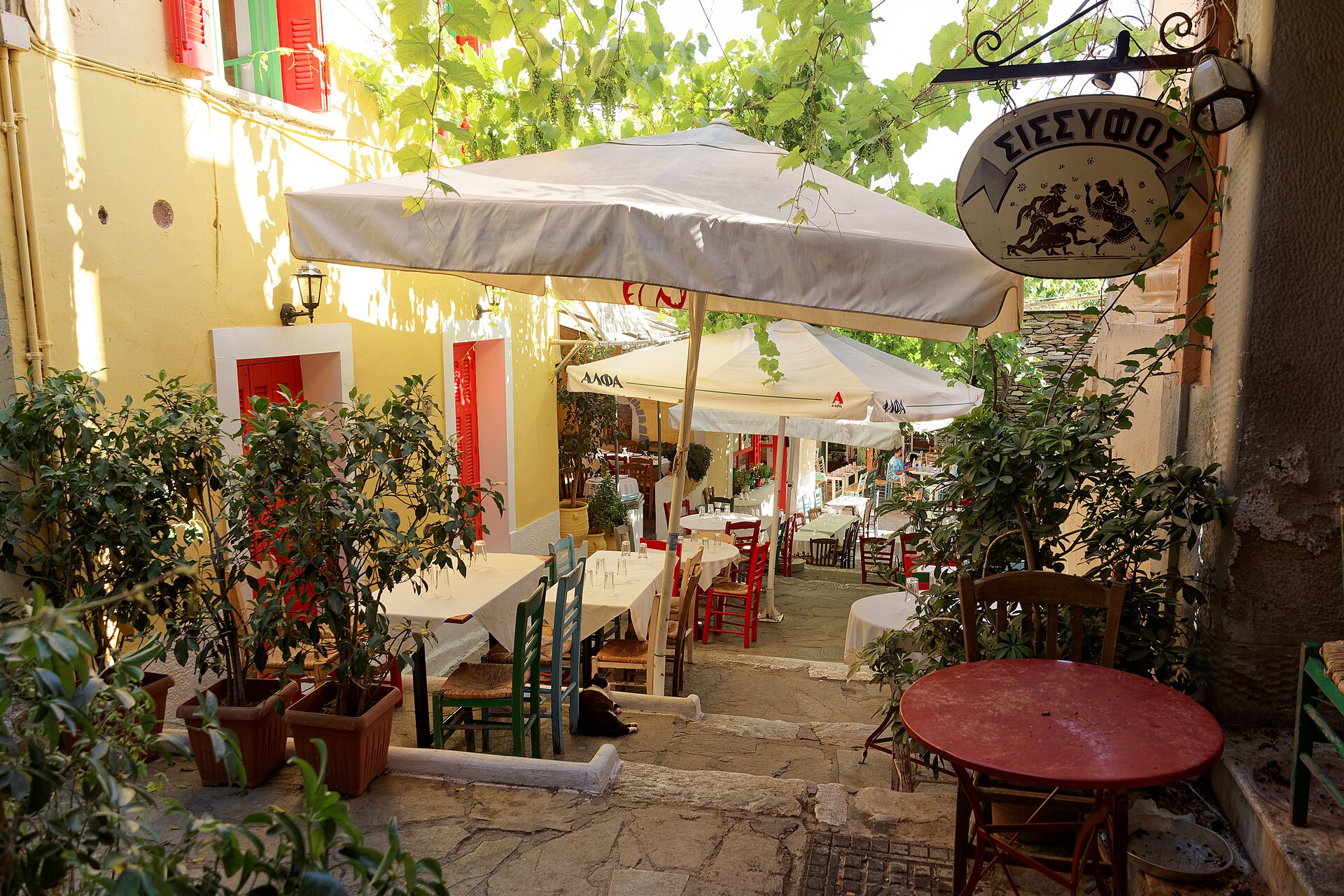 Restaurant-lined steps in the Plaka neighborhood of Athens
